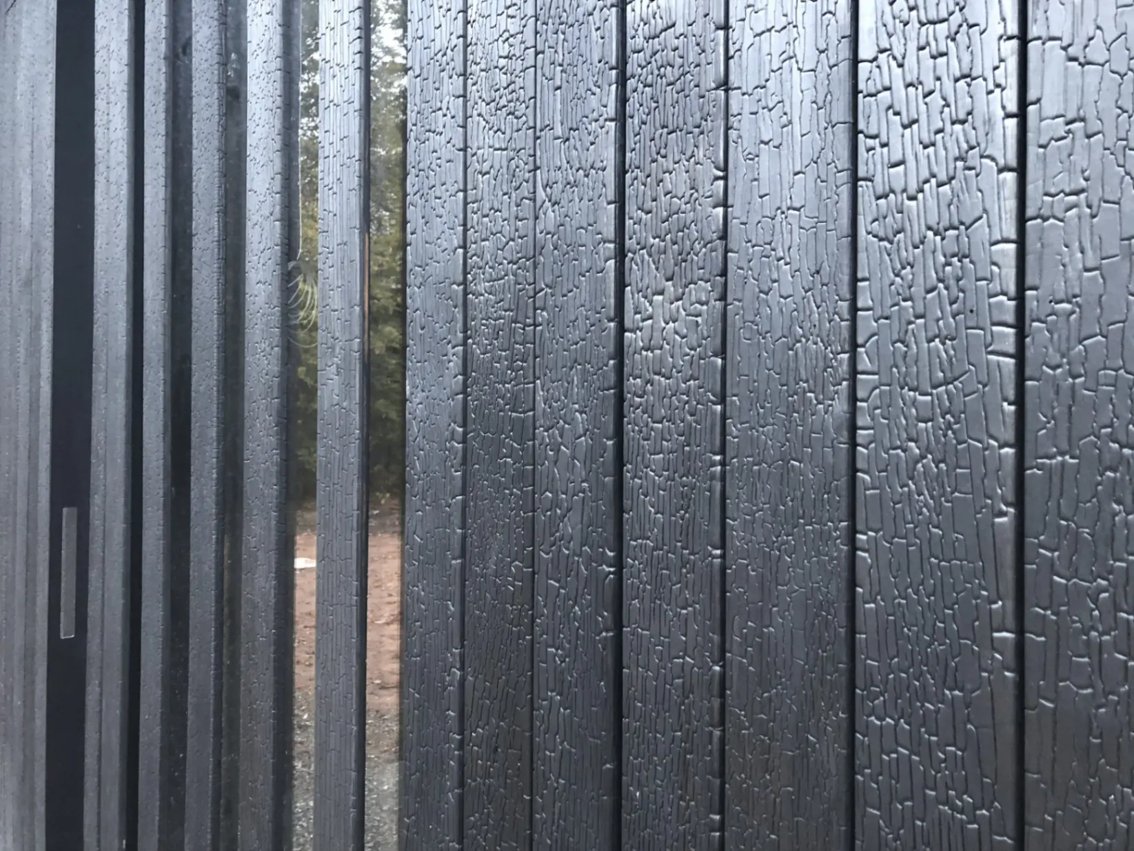 Black charred wood cladding texture